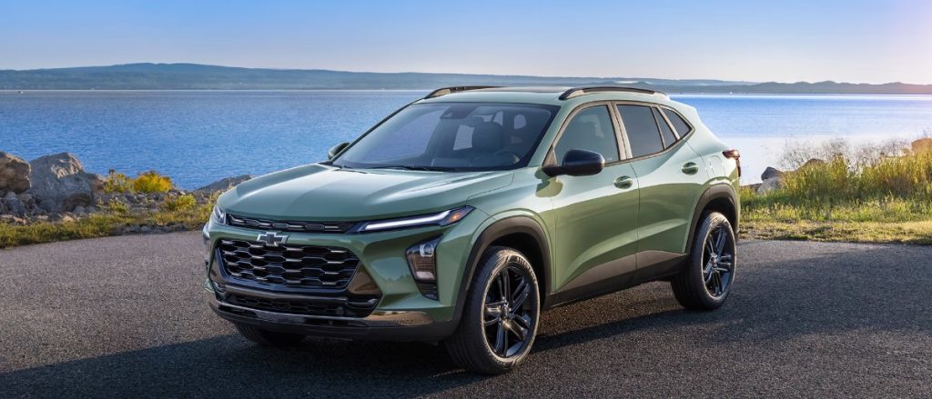 A Chevy Trax sits parked by a big body of water, sporting a gorgeous shade of green. Shop for your new Chevy Trax near Knoxville at Morristown Chevrolet!