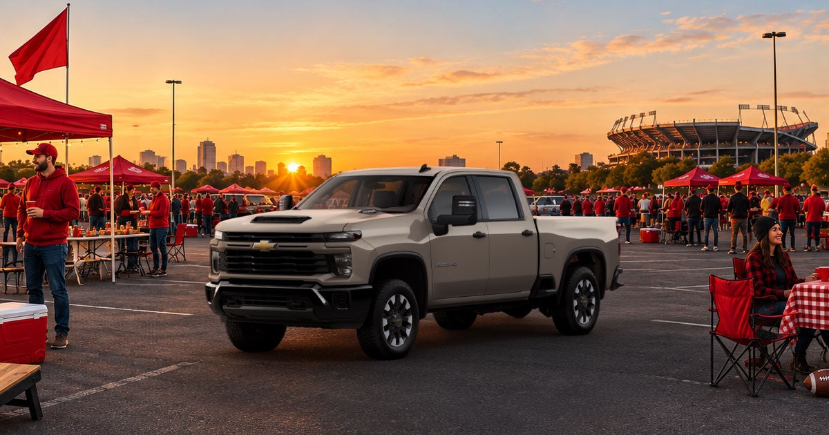 The Chevy Silverado is parked at a tailgate